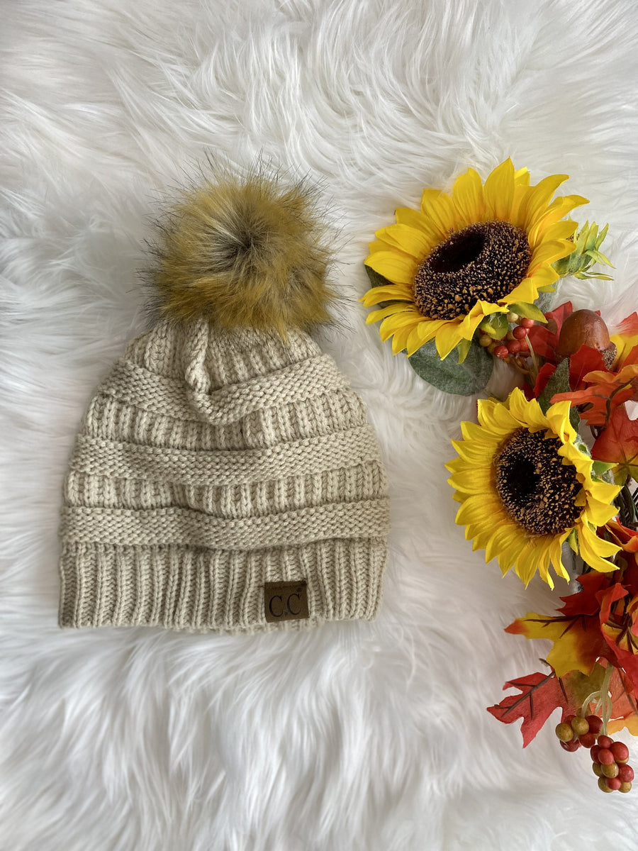 Hat-43 Cable Knitted Beanie With Faux Fur Pom - Beige